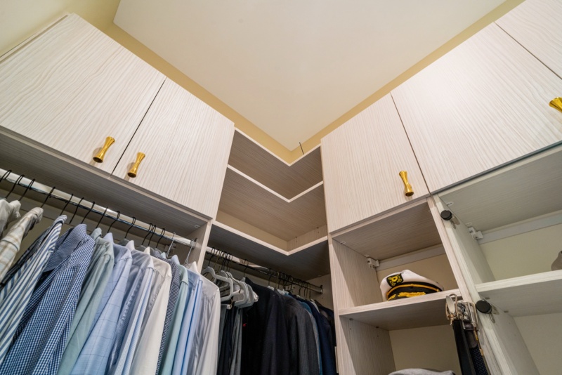 “His” Closet Mirrors the Elegance of Hers - Photo 11