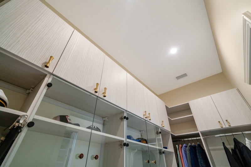 “His” Closet Mirrors the Elegance of Hers - Photo 12